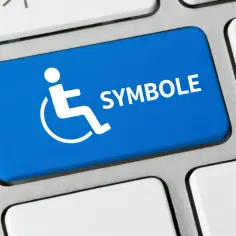 Niebieski klawisz z białym symbolem niepełnosprawności i napisem "SYMBOLE".